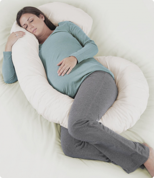 беременная спит на подушке