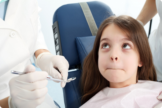 ребенок на приеме у стоматолога